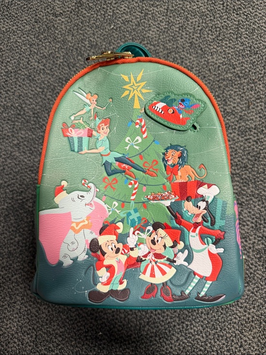 Loungefly Handbags - Disney Loungefly Mini Backpack with Holiday Character Print